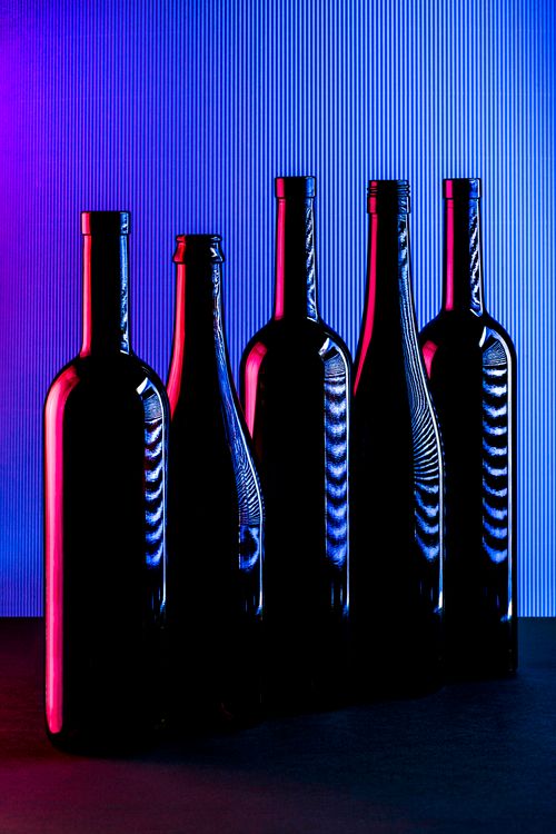 Abstract Wine Bottles with Vibrant Lighting  Free Stock Photo