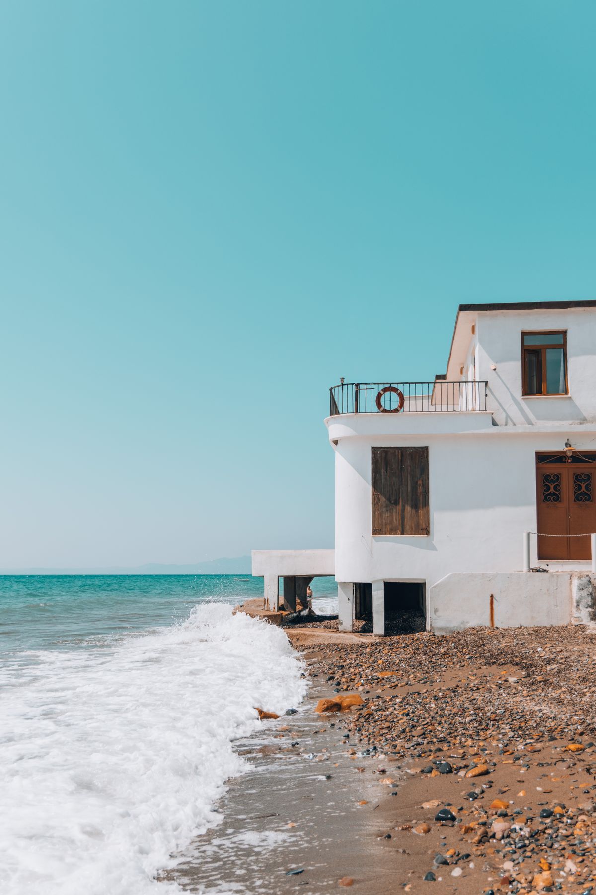 White Mediterranean house beside the sea