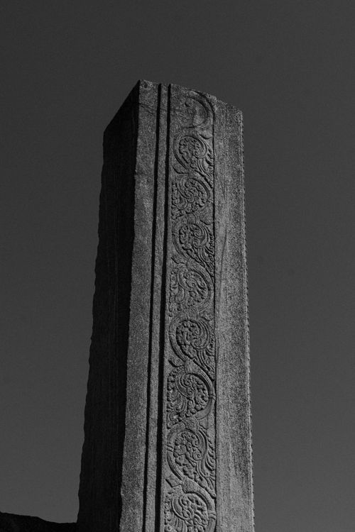 Free Detailed view of an intricately carved stone pillar in Melukote, Karnataka, India. Stock Photo