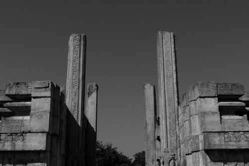 Free Black and white image of ancient stone structures at Melukote, Karnataka, India. Stock Photo