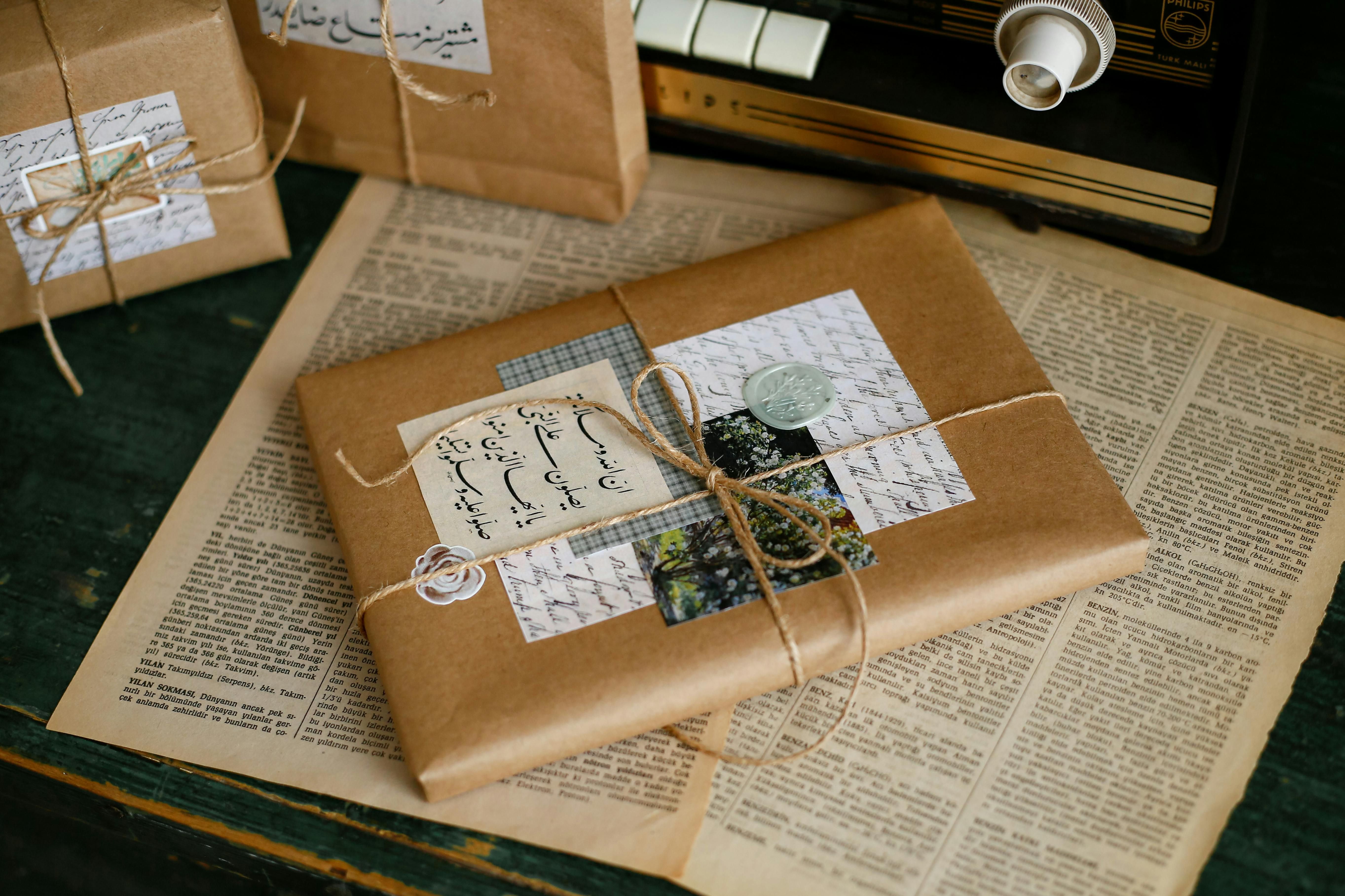Vintage Gift Wrapping with Books and Radio · Free Stock Photo