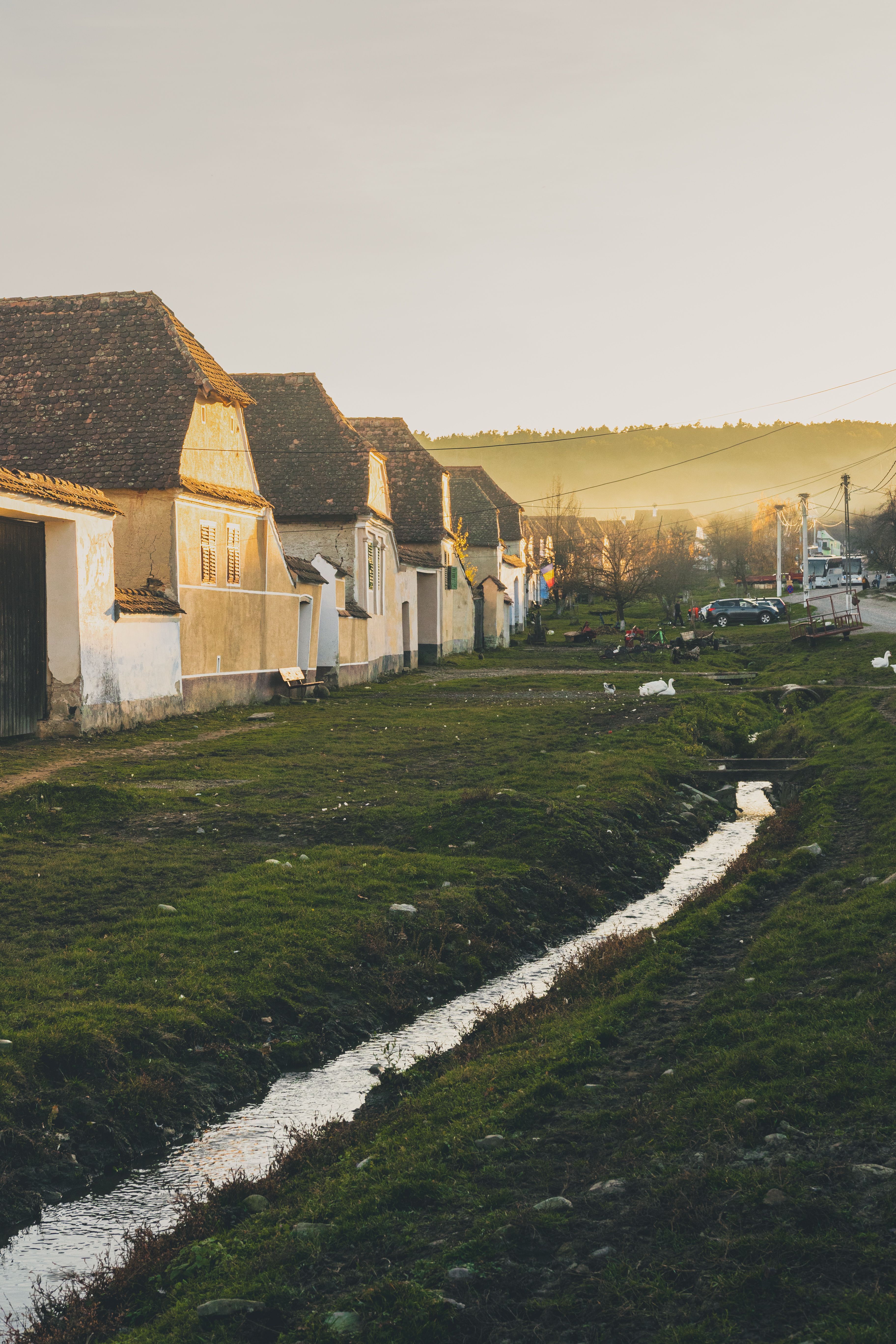 Charming Rural Village at Sunset in Romania · Free Stock Photo