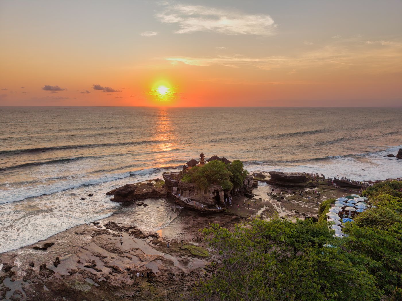 Best time to visit Tanah Lot Temple sunset view Bali 2026