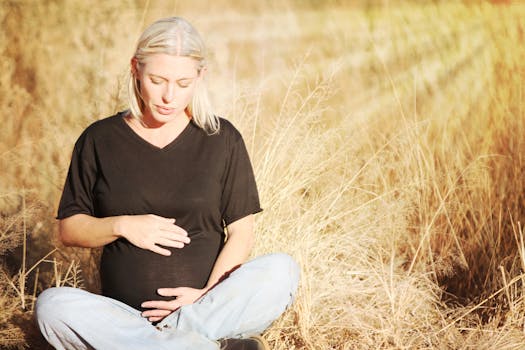 Free stock photo of woman, field, sitting, grass