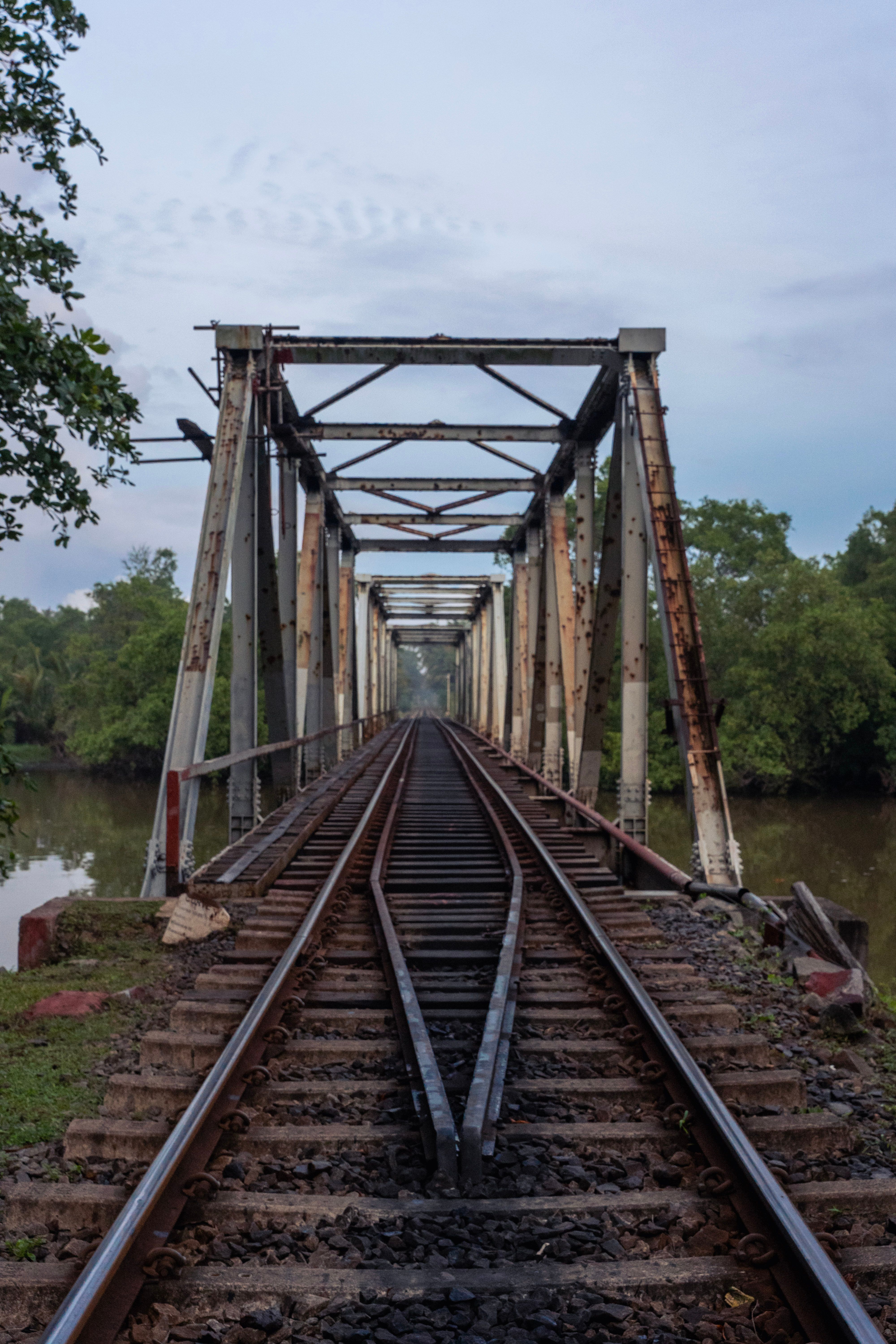 Rustic Railway Bridge Spanning Over River · Free Stock Photo