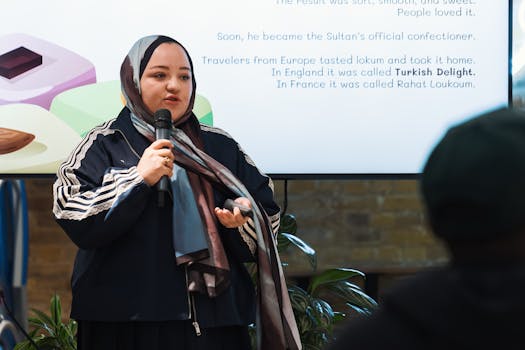 Woman giving a presentation on the history of Turkish Delight.