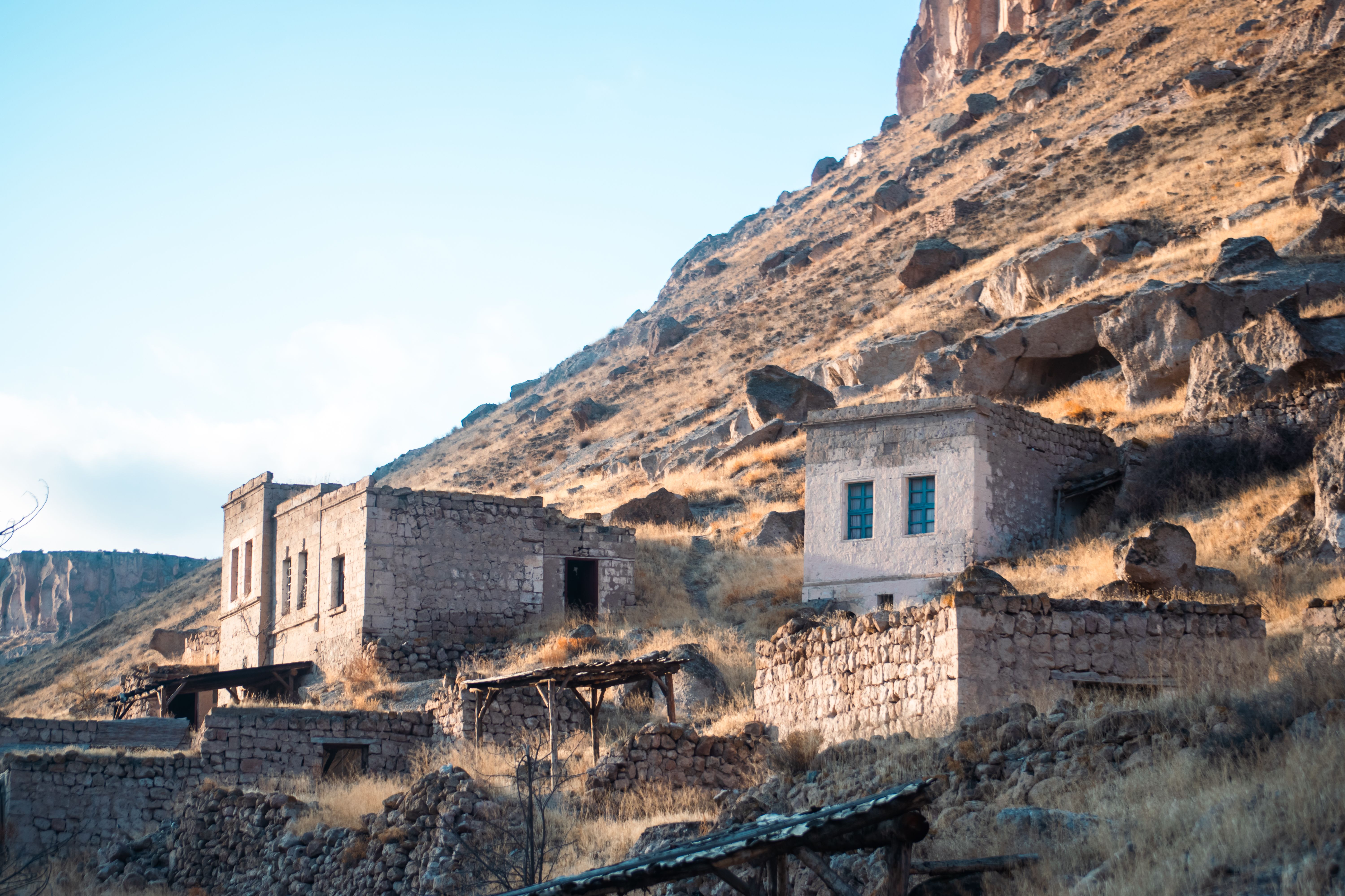 Abandoned Stone Houses in Arid Mountain Landscape · Free Stock Photo