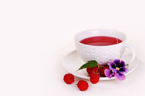 Free White Ceramic Cup on White Saucer Stock Photo