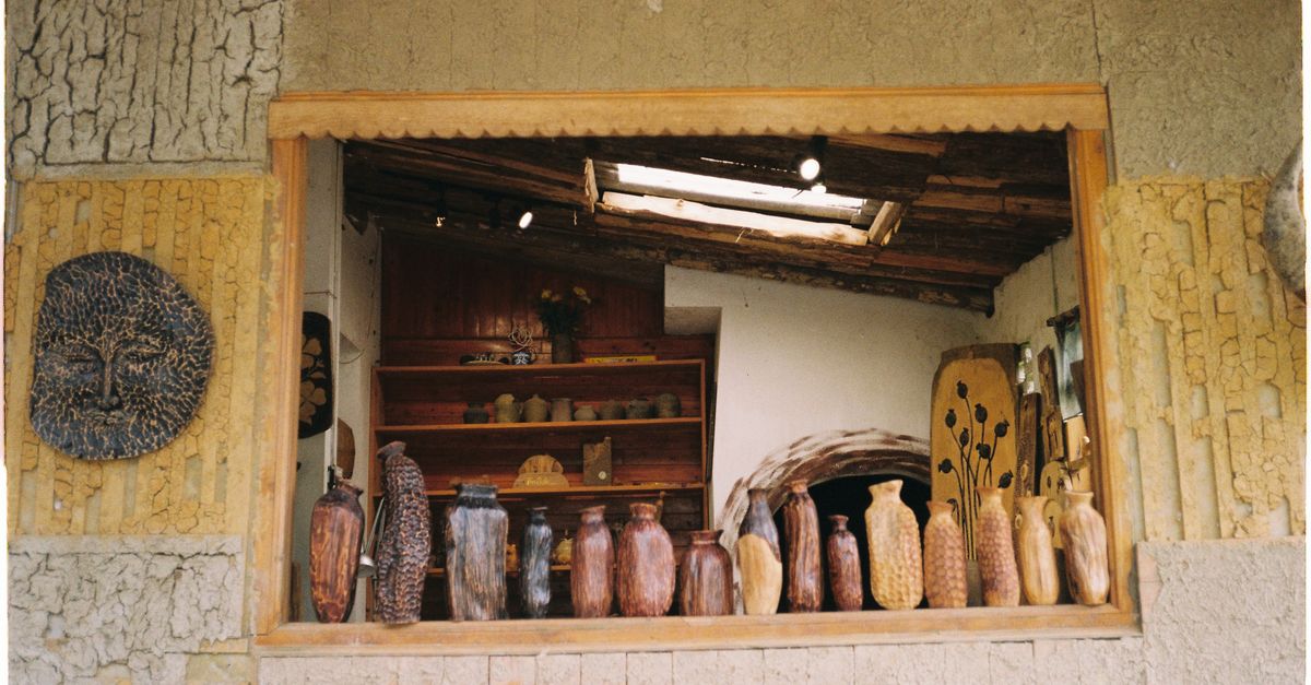 Pottery Display Window Rustic Pottery Display in Sapa Village Window · Free Stock Photo