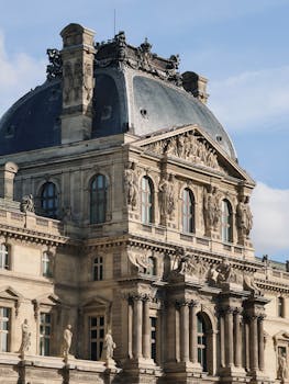 Elegant Baroque facade of the Louvre Museum in Paris showcasing historical architectural beauty.