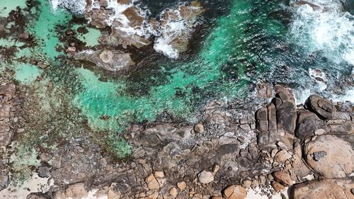 Free Breathtaking aerial shot of rocky coastline and turquoise waters in Western Australia. Stock Photo