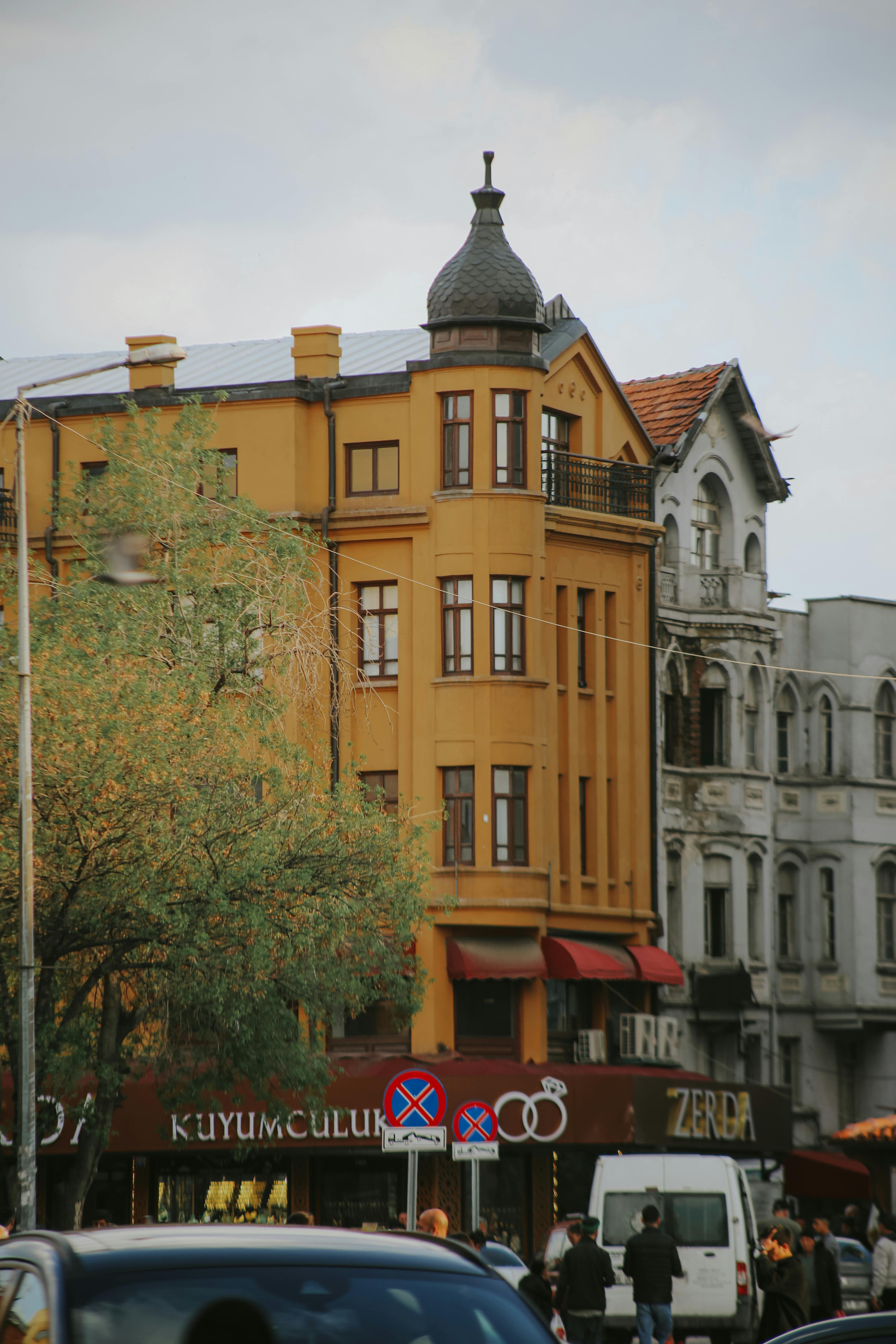 Historic architecture in a bustling street of Istanbul, capturing vibrant city life.