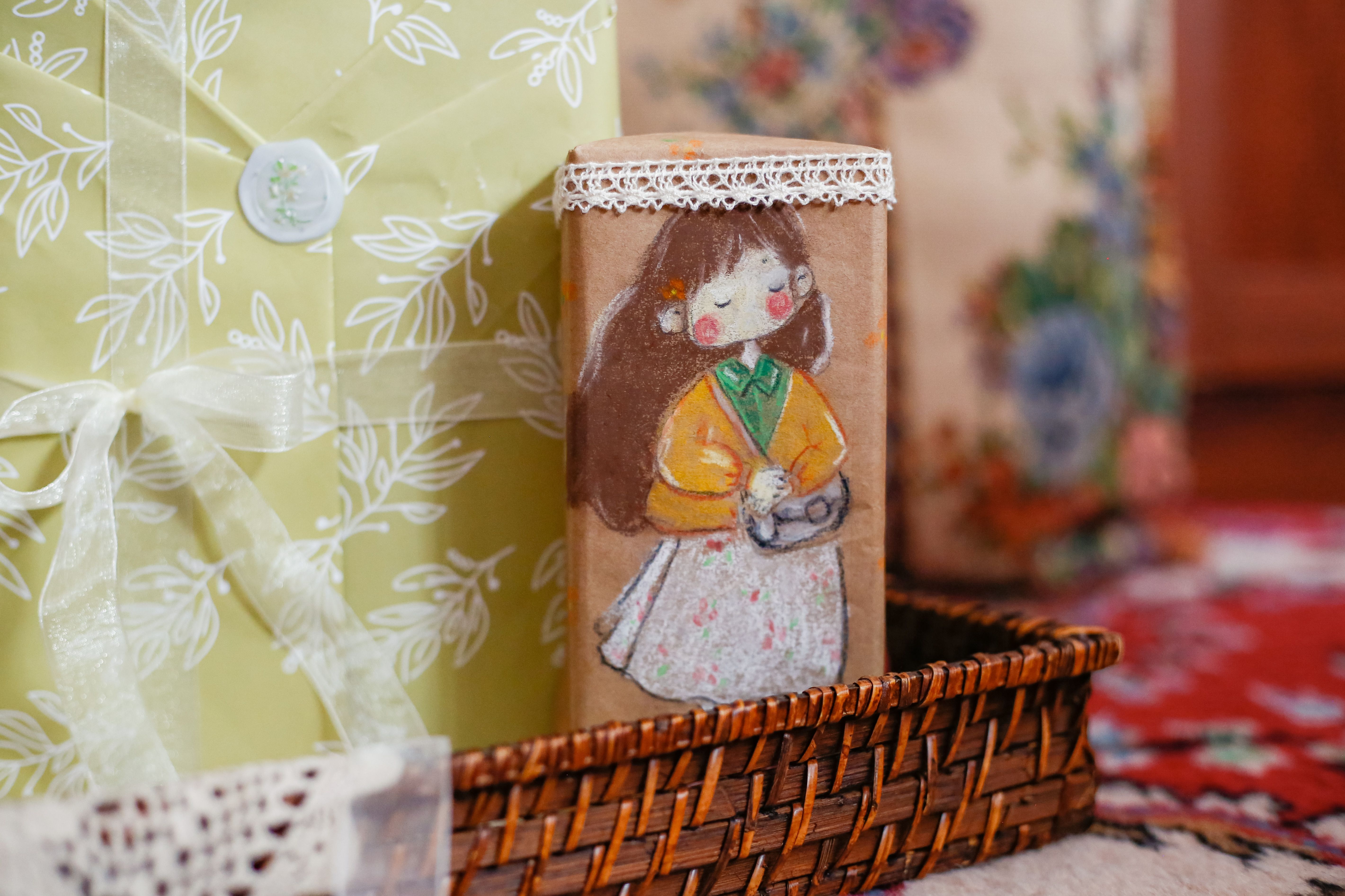 Cute handcrafted gift box featuring a whimsical illustration, perfect for special occasions.