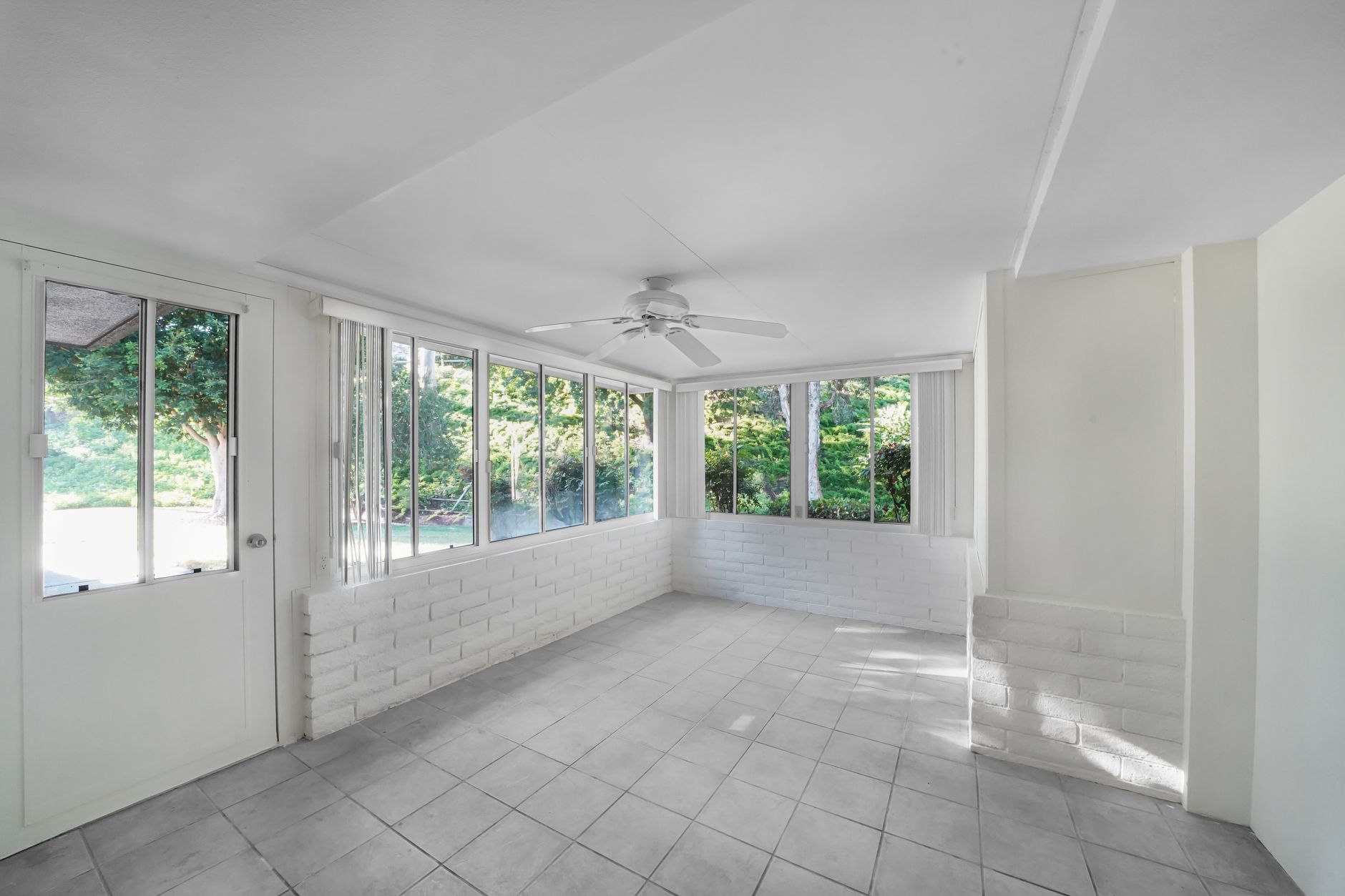 Sunroom addition with tiled floor and large windows, a smart home investment. Sunroom addition with tiled floor and large windows, a smart home investment.