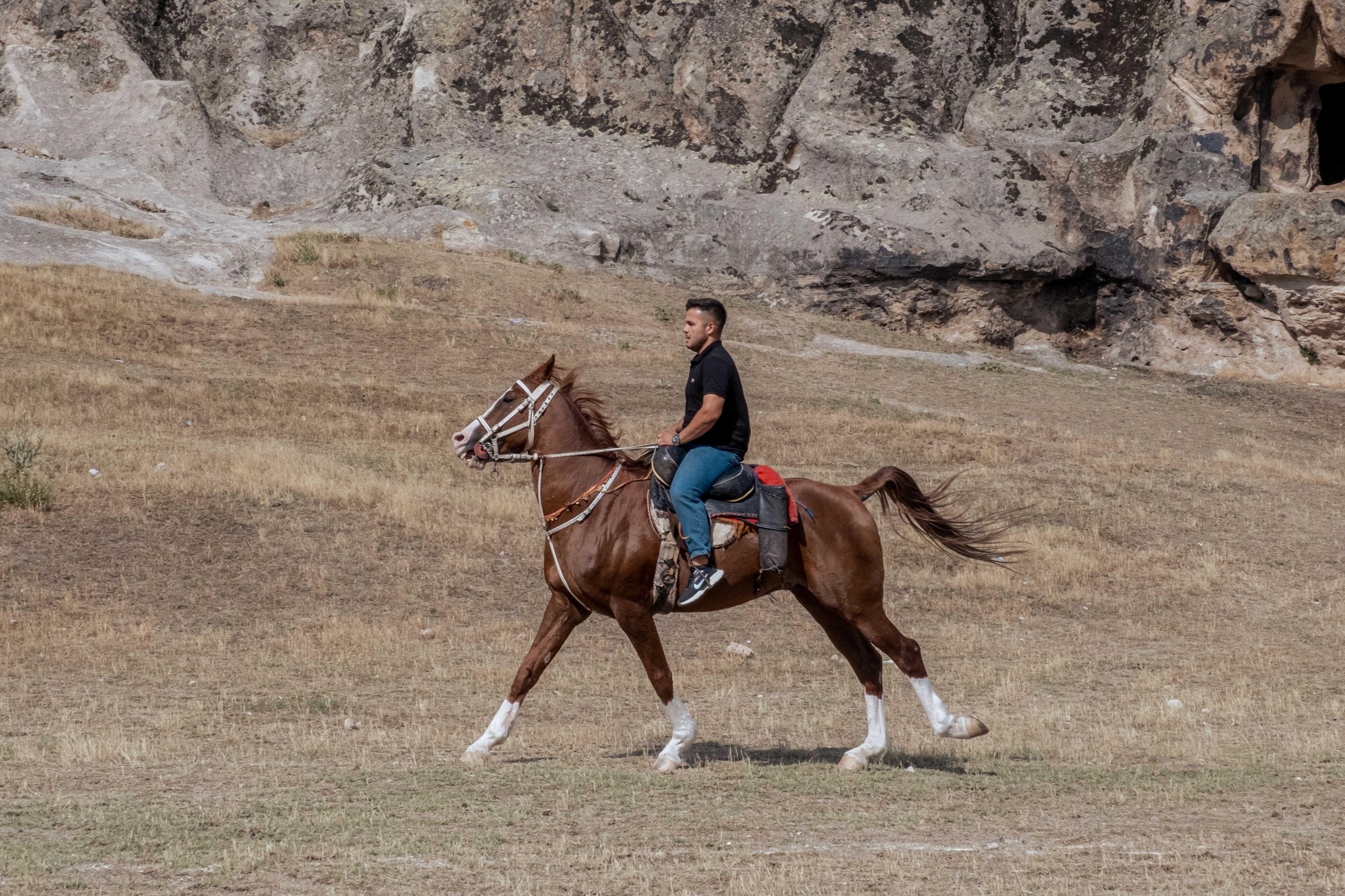 Man Riding Horse in Afyonkarahisar Landscape · Free Stock Photo