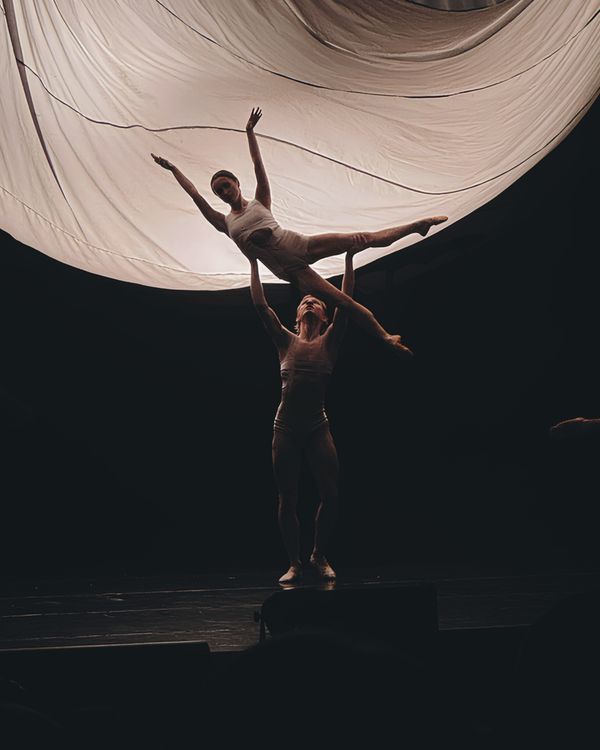 Graceful Acrobats Performing Artistic Dance · Free Stock Photo