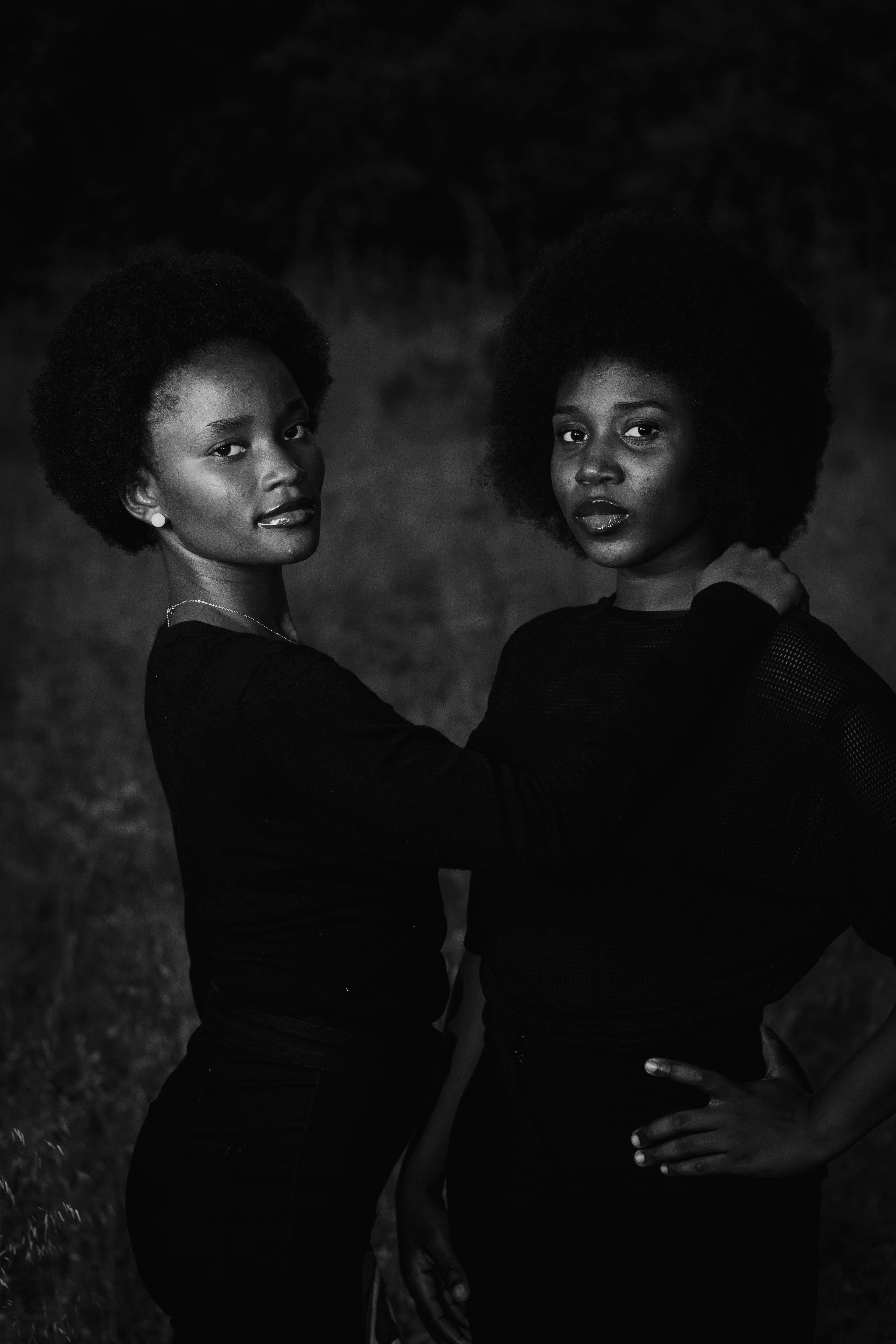 Elegant Black and White Portrait of Two Women Outdoors · Free Stock Photo