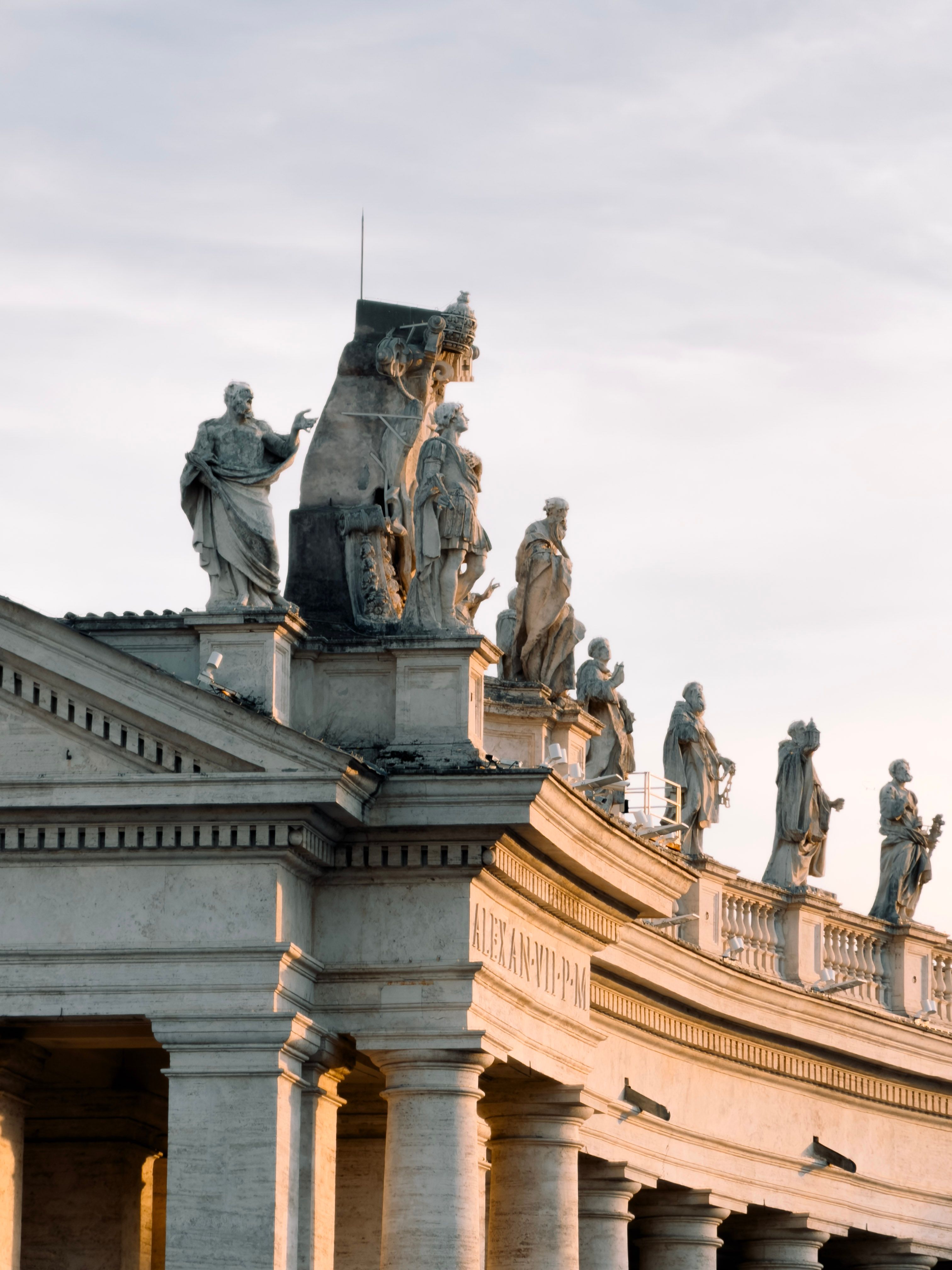 St. Peter's Square Colonnade at Sunrise in Vatican City · Free Stock Photo