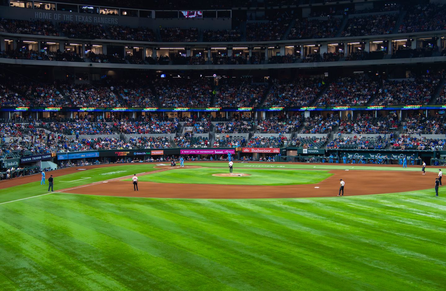 A baseball game under way in a packed ballpark