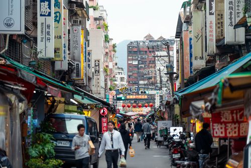 Free Vibrant street scene in Yongkang District, Taipei, showcasing local shops and bustling activity. Stock Photo