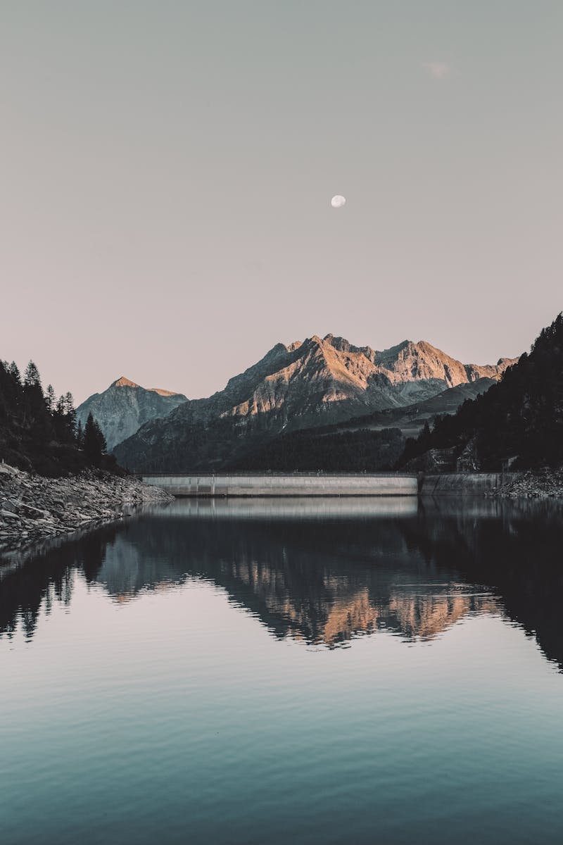 Hand writing in journal near window