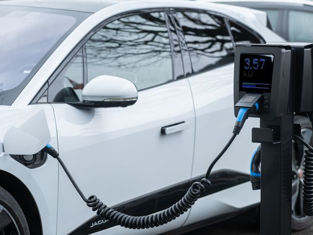 Electric car charging with a display Electric car charging at a charging station with a display