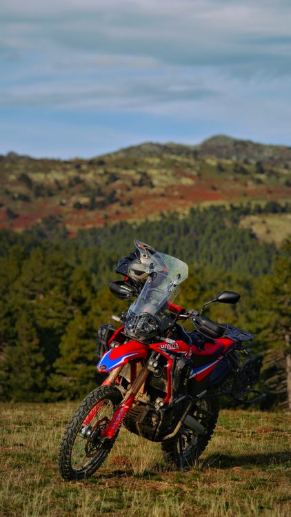 Motorcycle In Nature Adventure Motorcycle in Scenic Mountain Landscape · Free Stock Photo