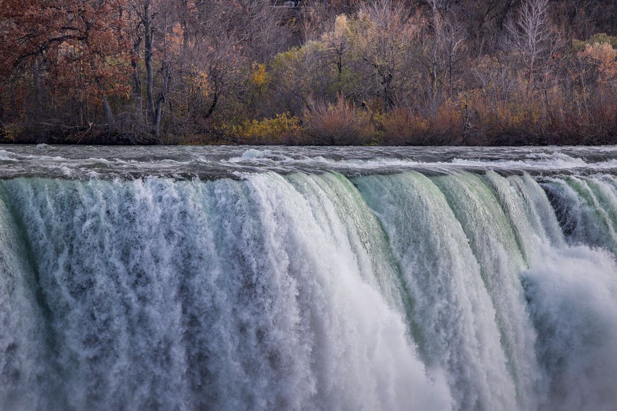 Autumn scene at Niagara Falls with vibrant foliage