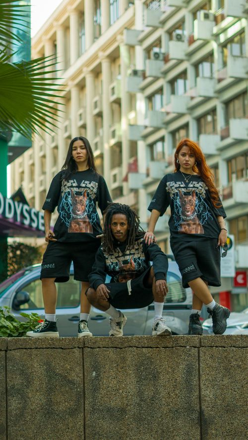 Free Three diverse adults pose in fashionable streetwear in Casablanca, showcasing urban style. Stock Photo