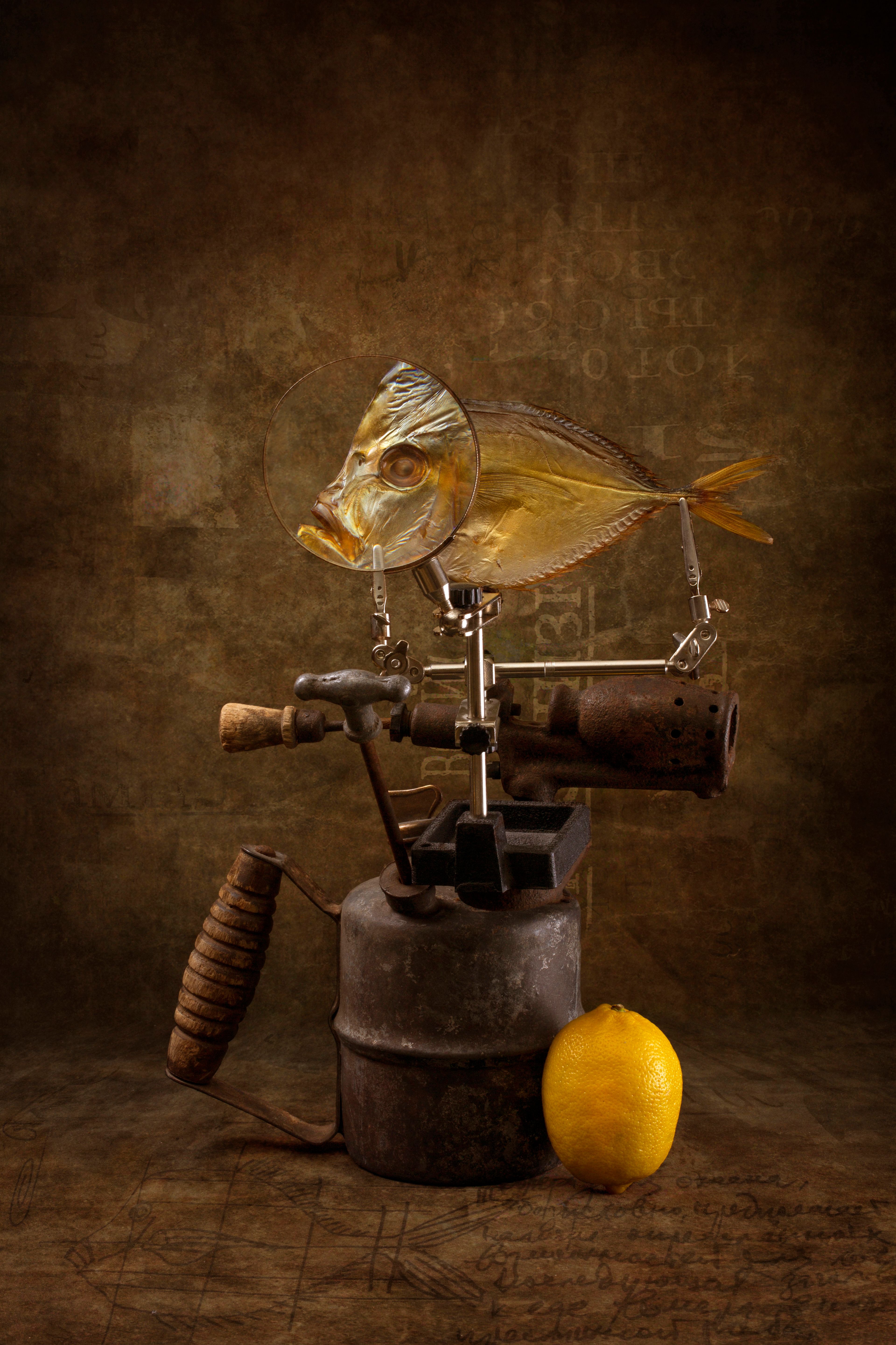 A surreal artistic composition of a mechanical fish with a lemon on a vintage background.