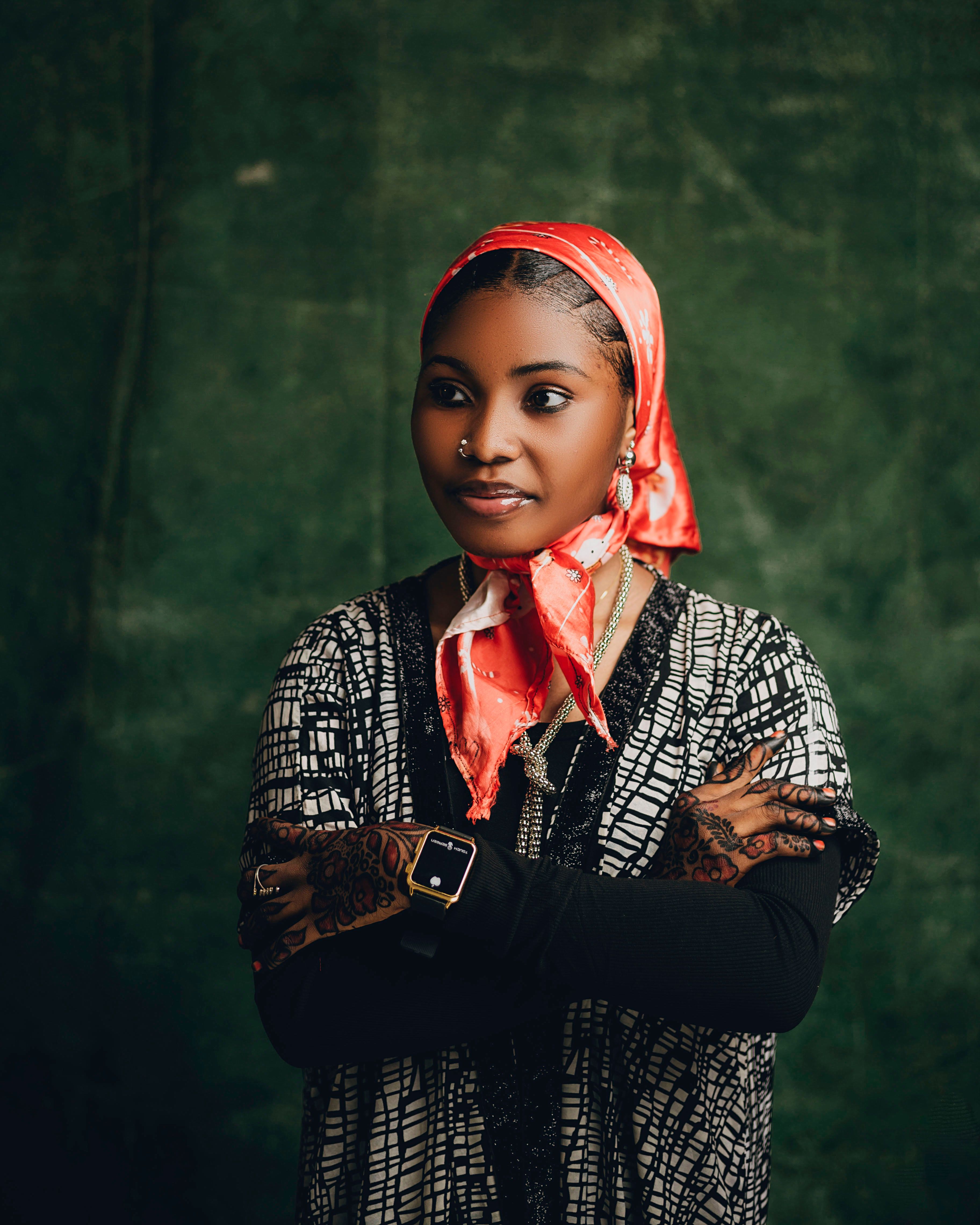 Elegant Woman in Traditional Headscarf Portrait · Free Stock Photo