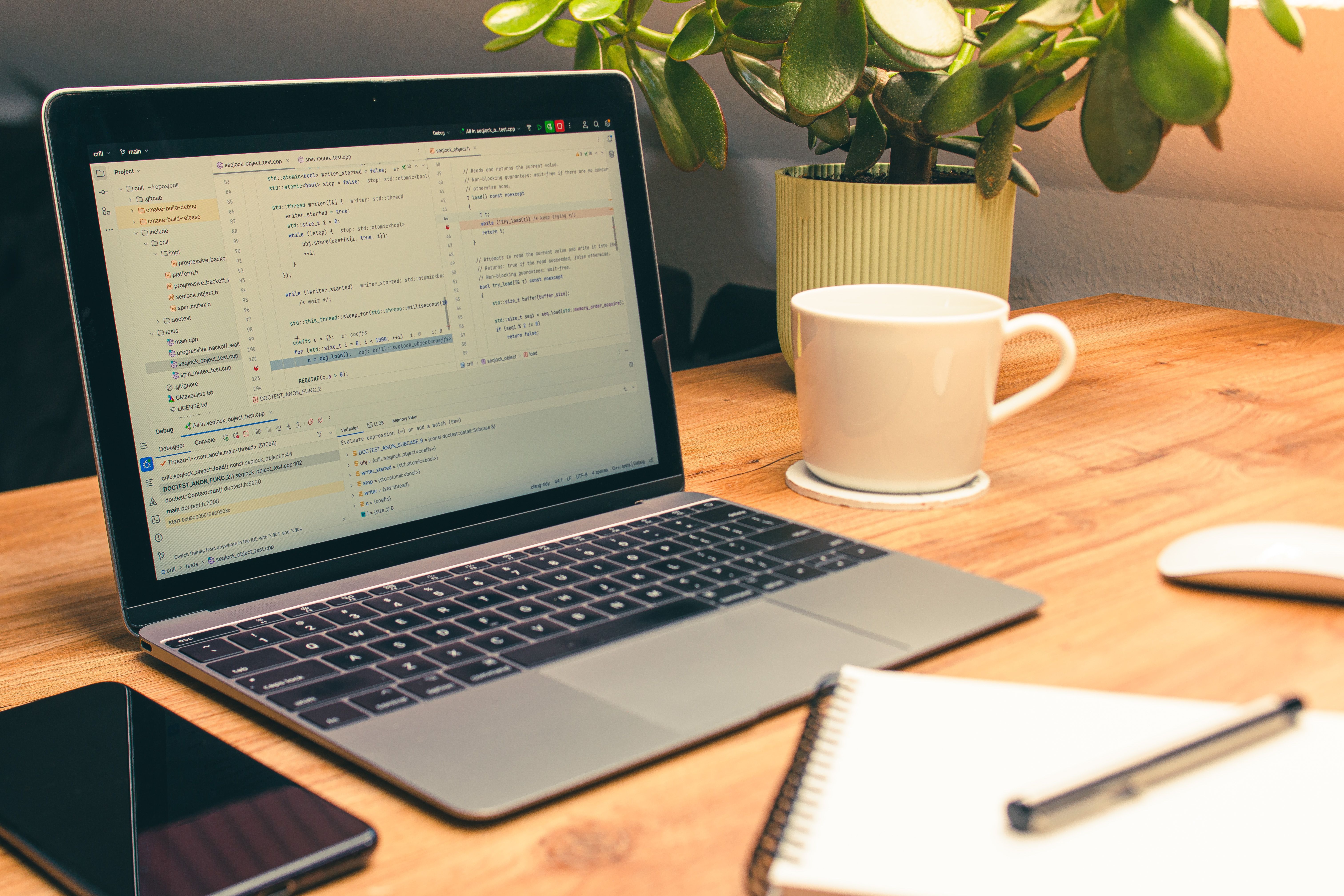 Home office workspace with laptop and coffee