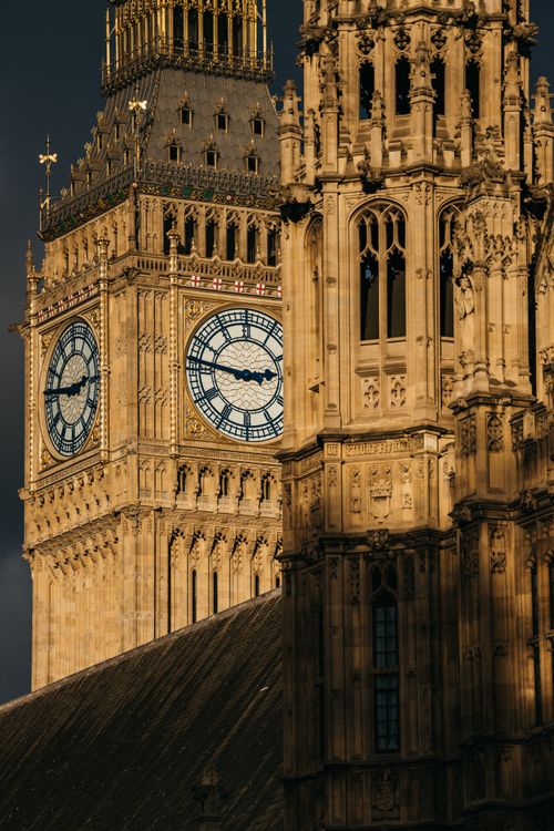 Free Close-up of London's iconic Big Ben and Elizabeth Tower with rich sunlight. Stock Photo
