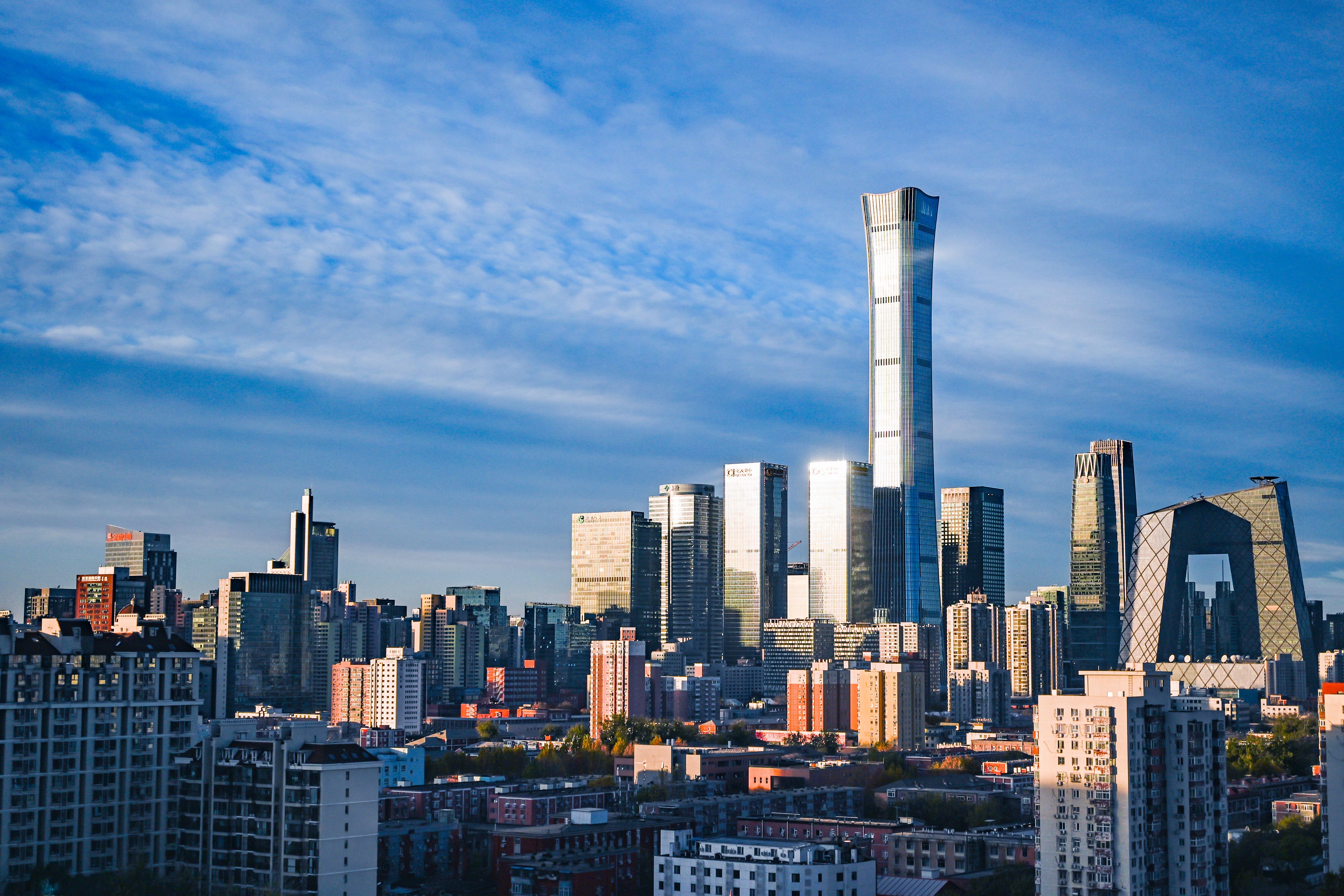 Free Stunning view of Beijing's skyline featuring the China Zun Tower under a vibrant blue sky. Stock Photo