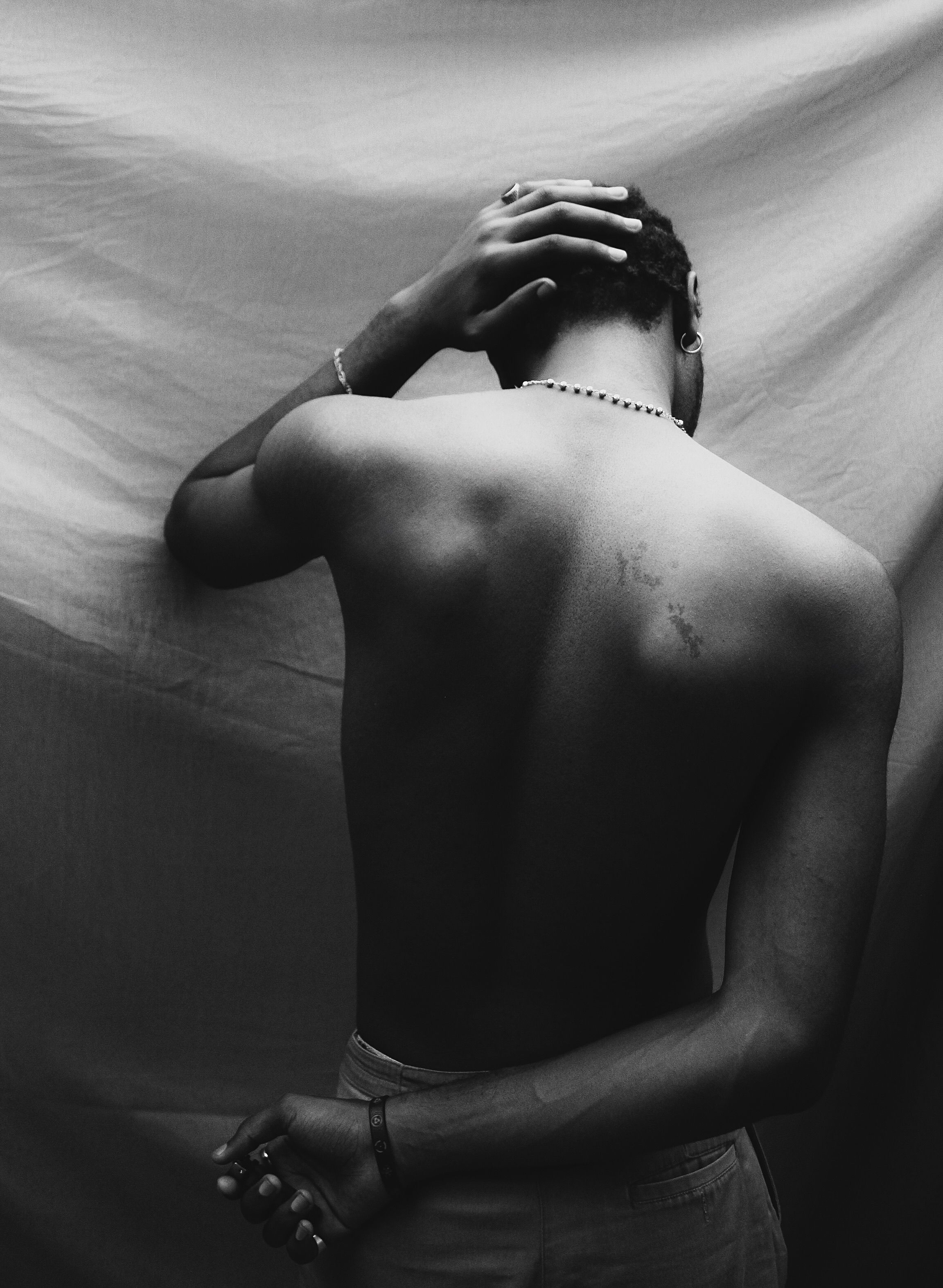 Moody Black and White Portrait of Man's Back · Free Stock Photo