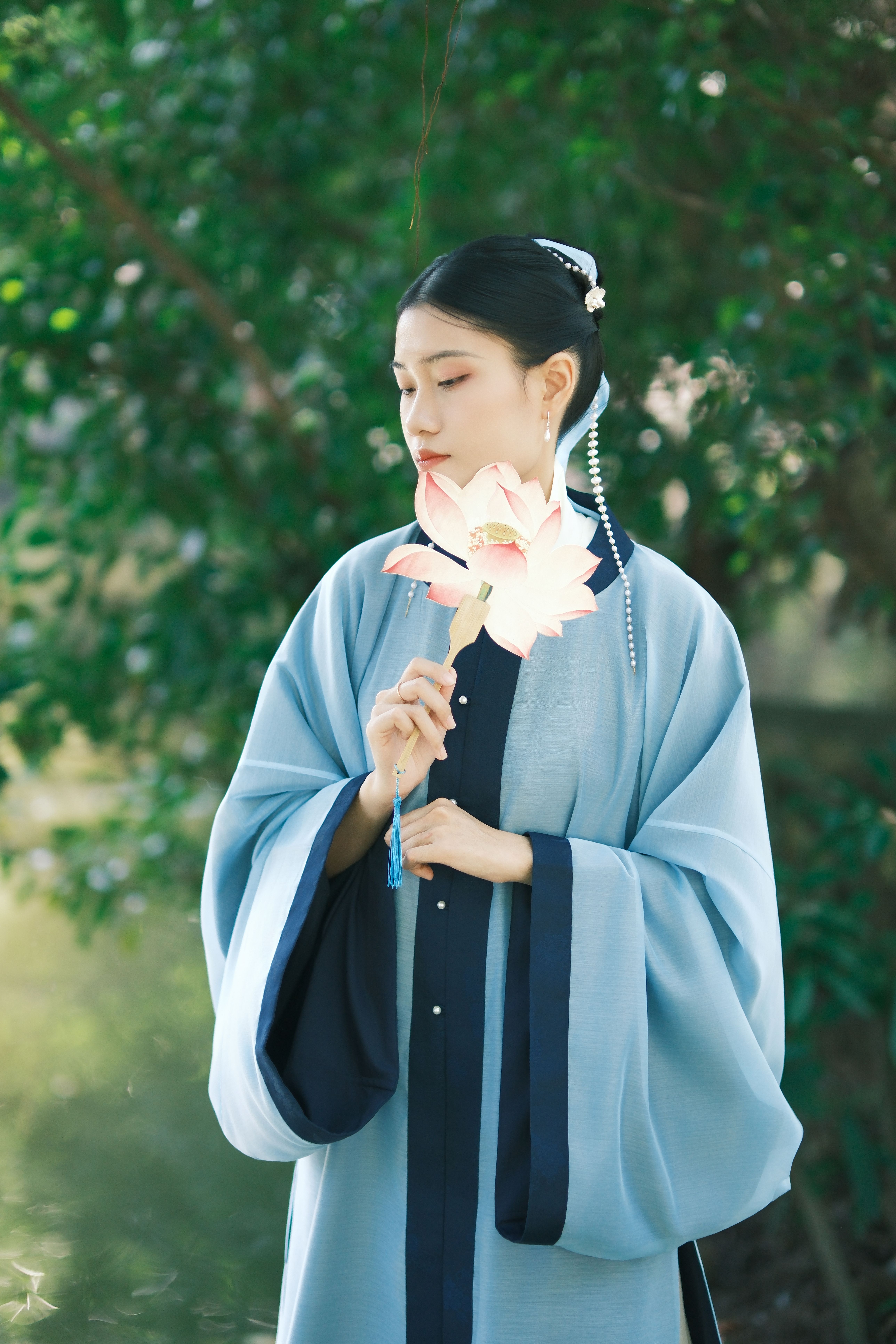 Elegant Portrait of Woman in Traditional Attire Outdoors · Free Stock Photo