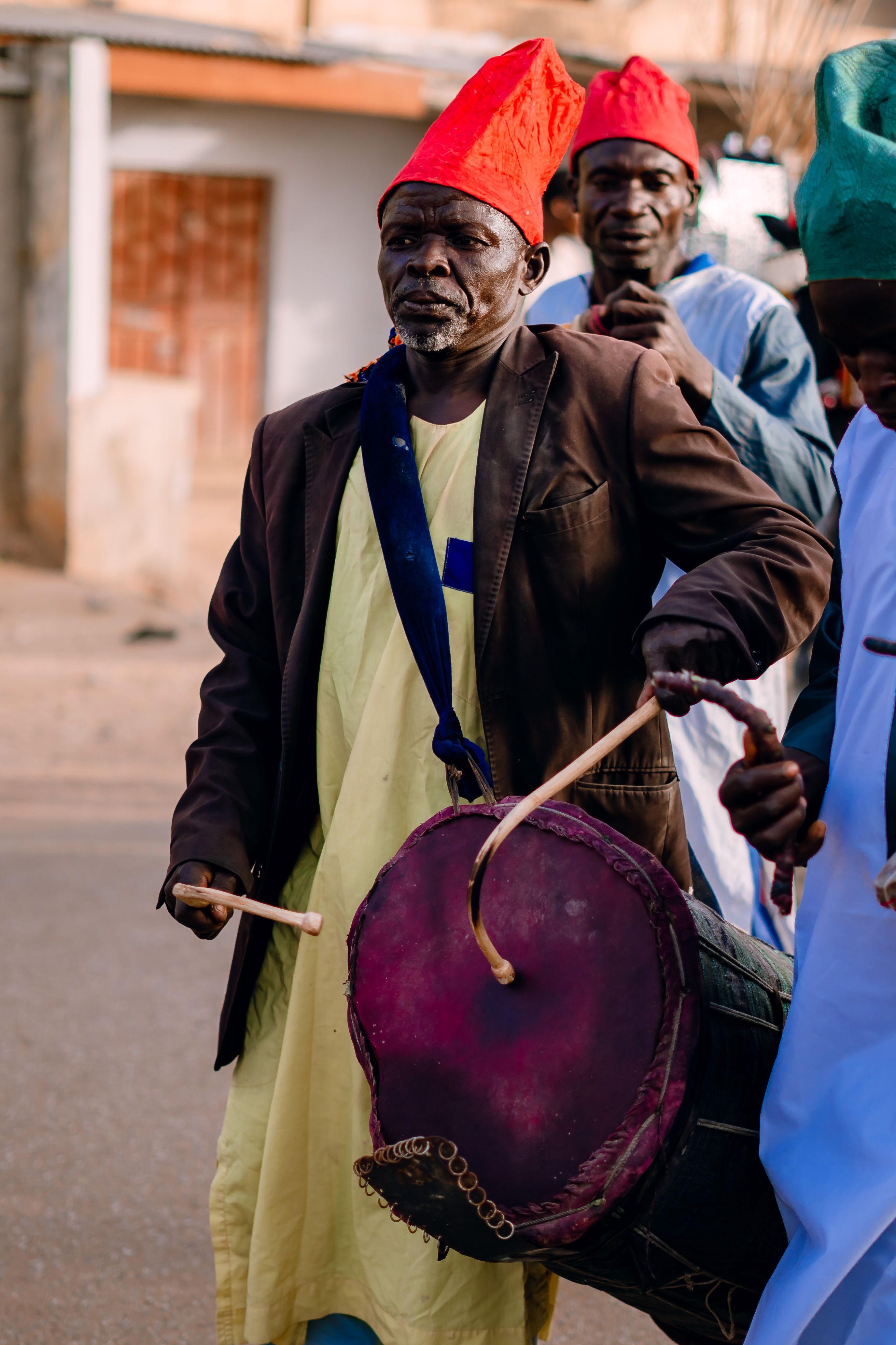 Traditional Drummers in Colorful Attire Performing · Free Stock Photo