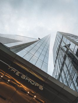 Low angle view of modern skyscrapers in New York's skyline, showcasing architectural elegance.