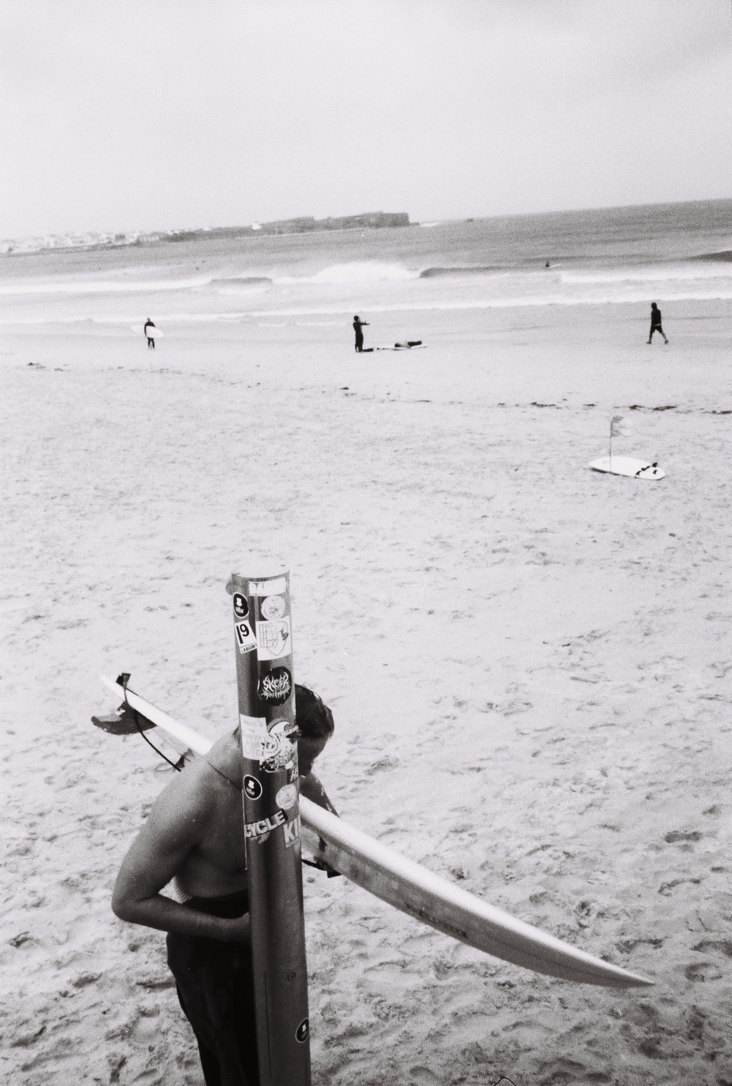 Black and White Beach Surfing Scene with Surfer · Free Stock Photo
