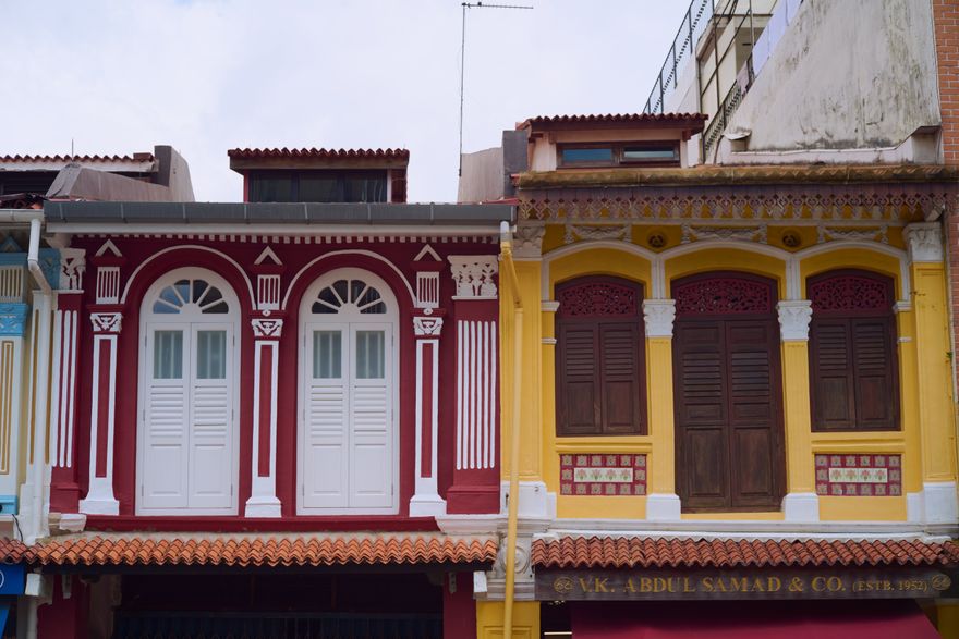 Colourful heritage shophouses on a market street, photo by CK Seng on Pexels