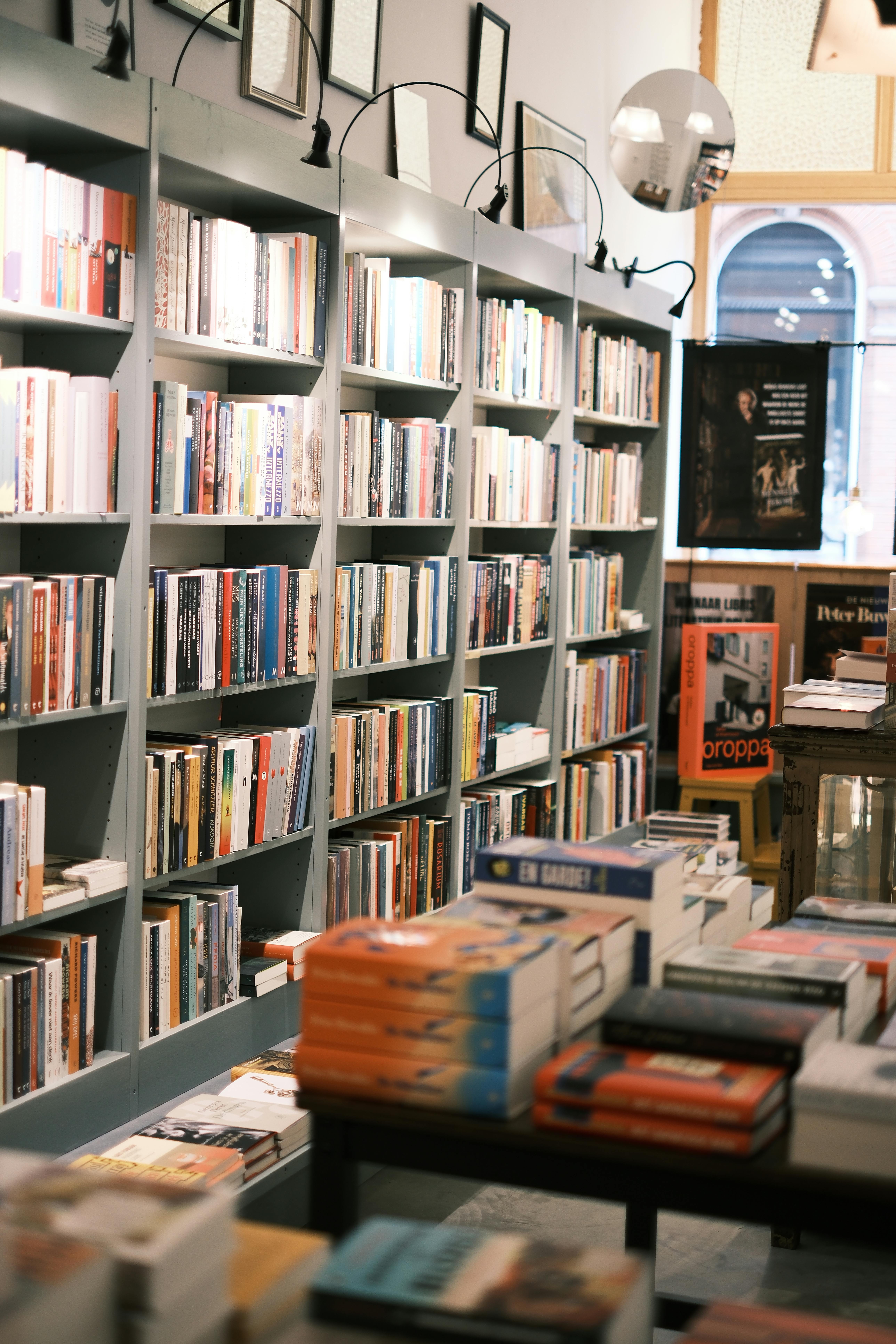 Free Inviting bookstore with shelves full of books, creating a cozy and literary atmosphere. Stock Photo