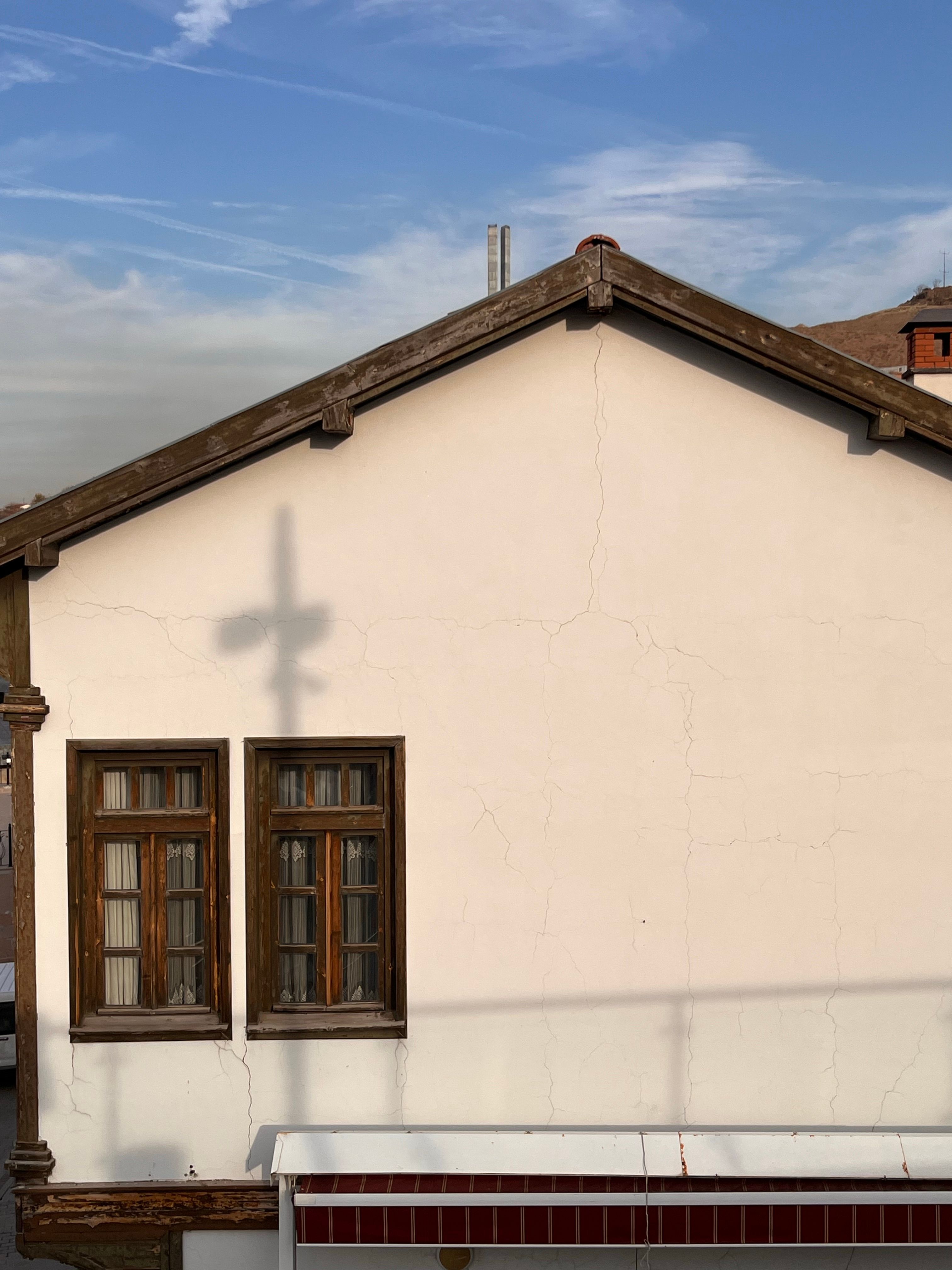 Rustic Facade of Traditional House with Shadow · Free Stock Photo