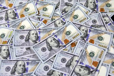 A scattered pile of banknotes