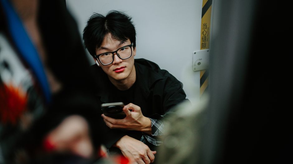 Person using a smartphone in China, accessing international apps via a VPN