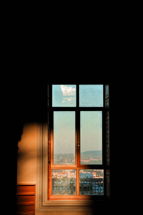 Subtle Window View Tranquil Window View with Cityscape and Warm Light · Free Stock Photo