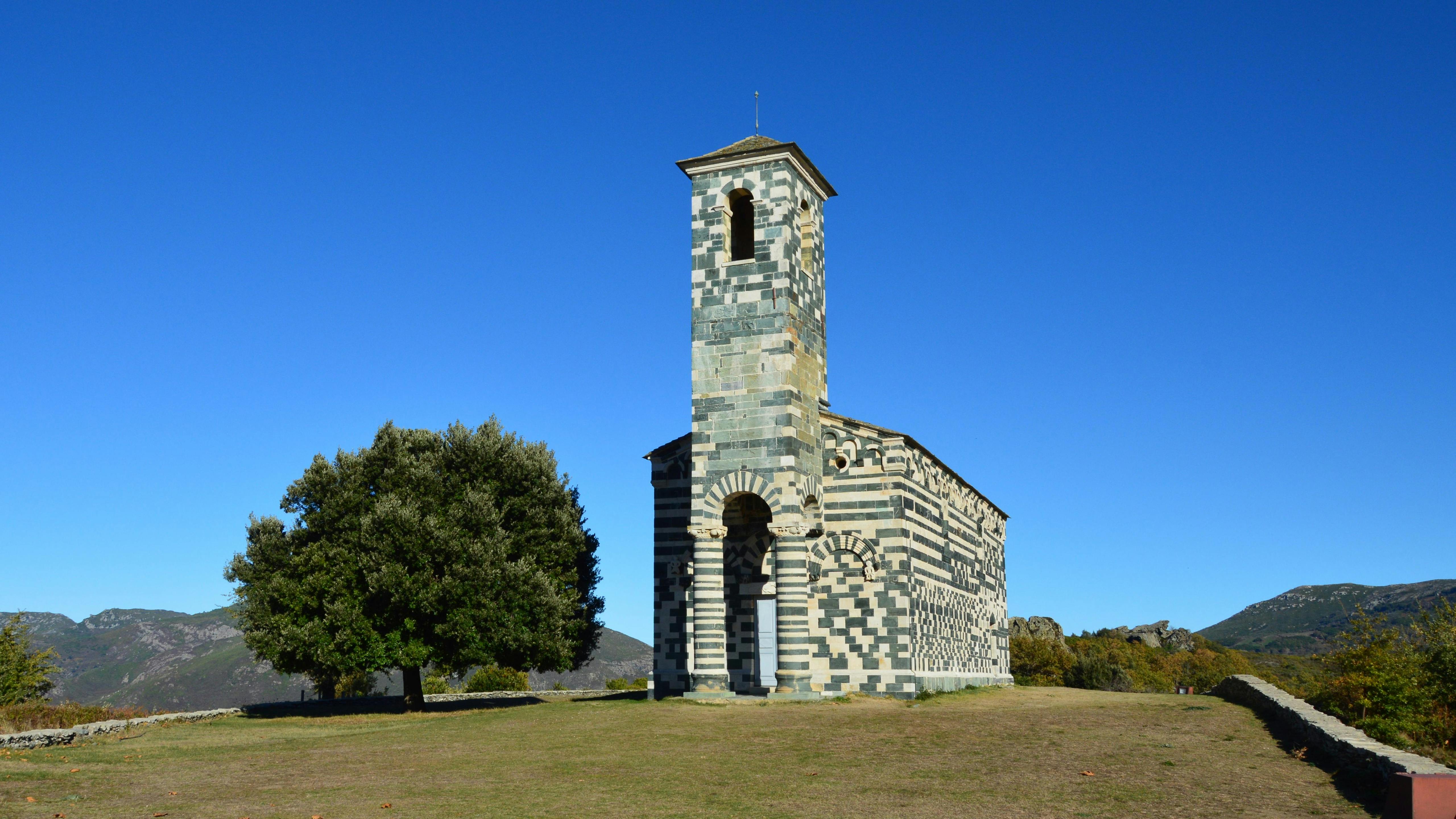 Striking view of San Michele church with blue sky in Murato, Corsica.