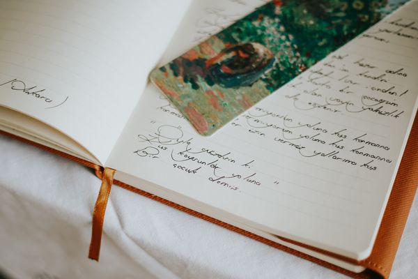 Open journal on a desk — betul nur akyurek on Pexels