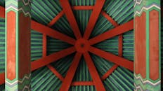 Geometric Ceiling with Orange and Green Design