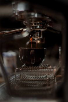 Close-up of espresso shot being brewed in a cafe in Kermanshah, Iran.