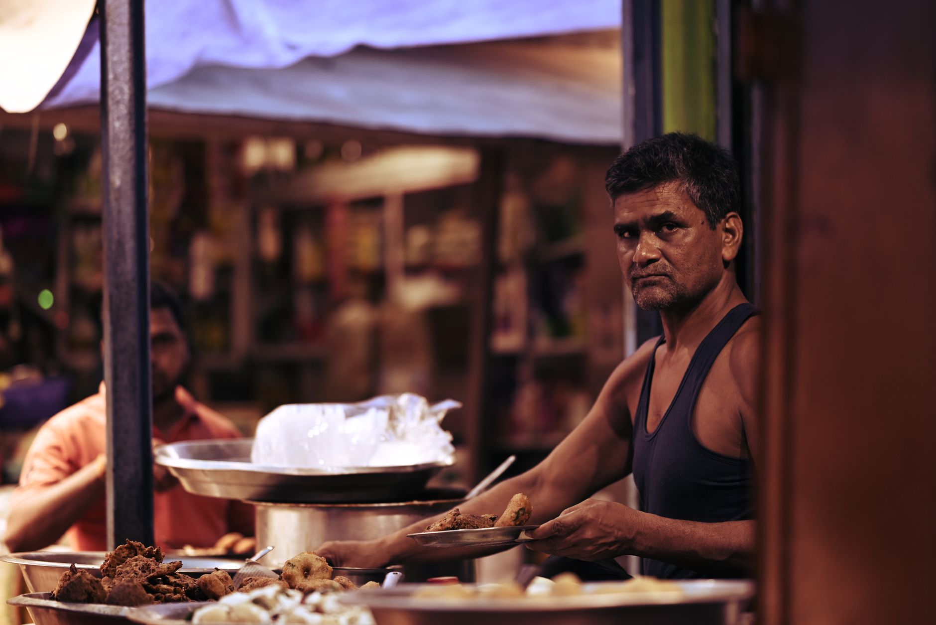 Street food vendor in India serving traditional snacks